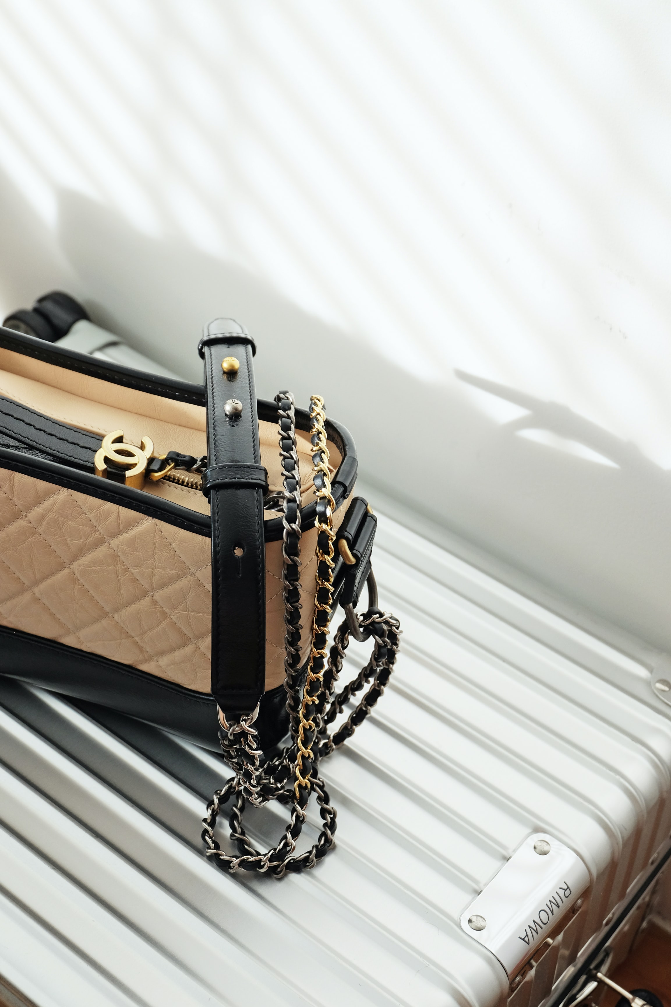 Acting rich: recession sees roaring trade in champagne and Louis Vuitton  handbags, Retail industry